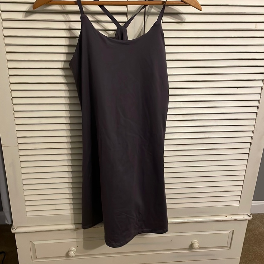 Athletic Dress built in bra and shorts with pockets. Never worn.